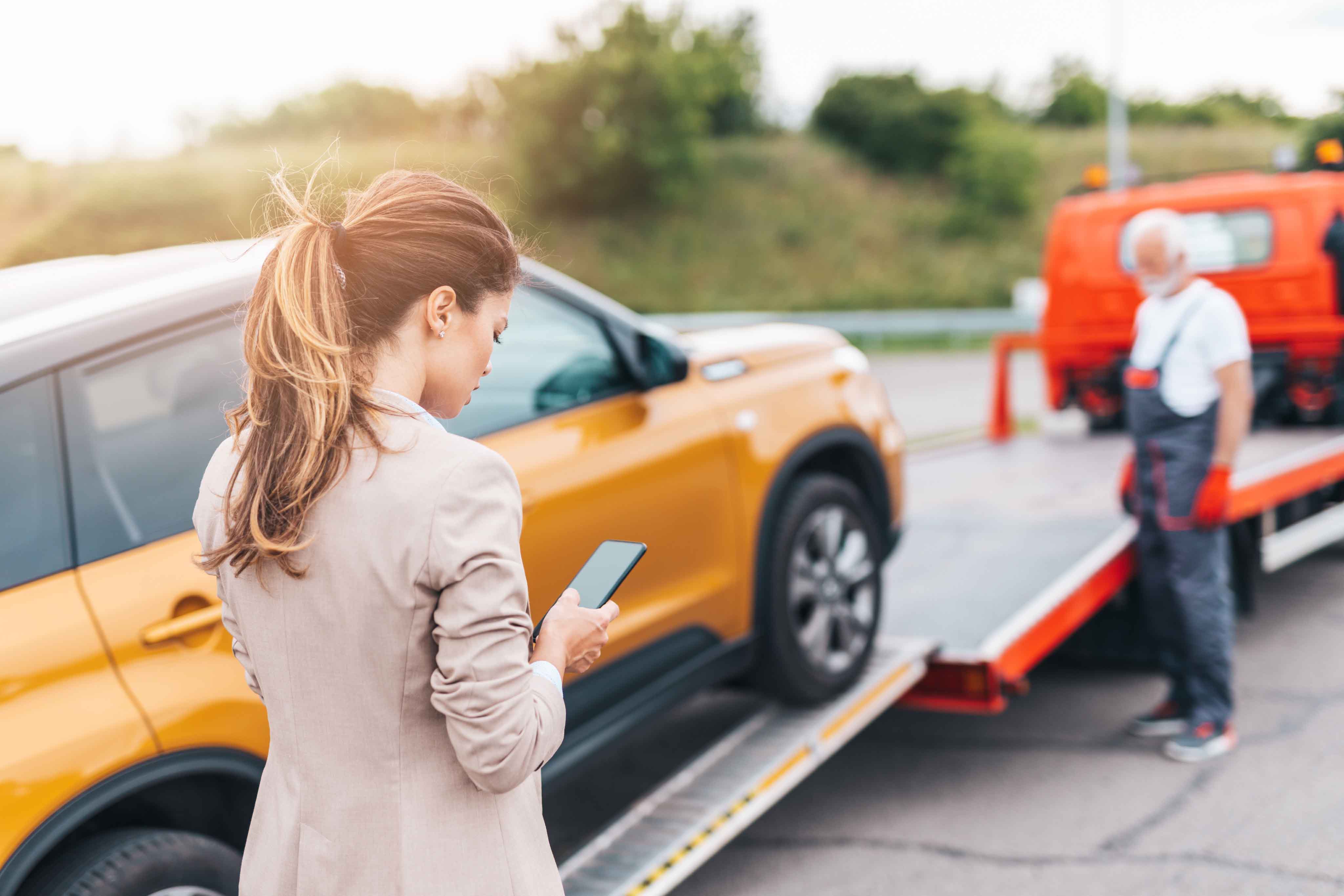 woman with tow truck